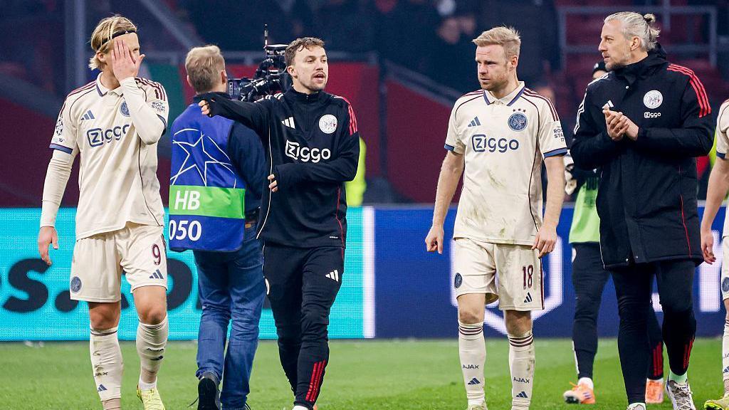 Ajax's players walk off after defeat to Benfica