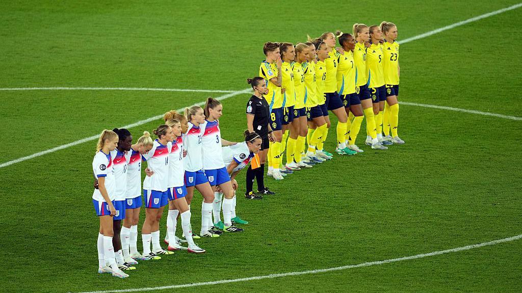 england and sweden women's teams lining up to take penalties