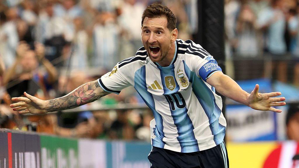 Lionel Messi celebrates with his arms stretched wide after scoring in the 2026 FIFA World Cup