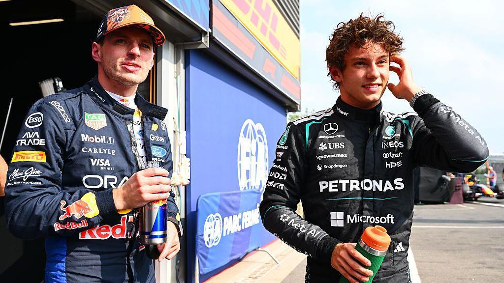 Max Verstappen and Kimi Antonelli stood in the pit lane after qualifying for the Belgian Grand Prix