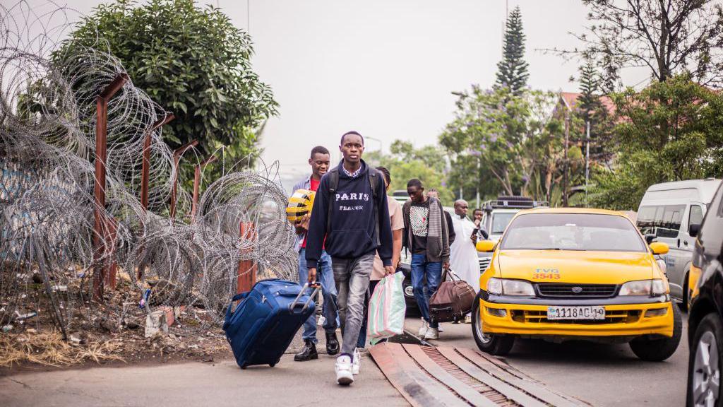 Non essential civil personnel of the United Nations Organization Stabilization Mission in the Democratic Republic of the Congo (MONUSCO) are seen leaving ahead of their evacuation in Goma on January 25, 2025