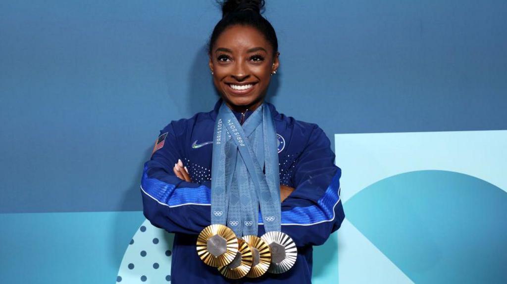 Simone Biles with all her Paris medals