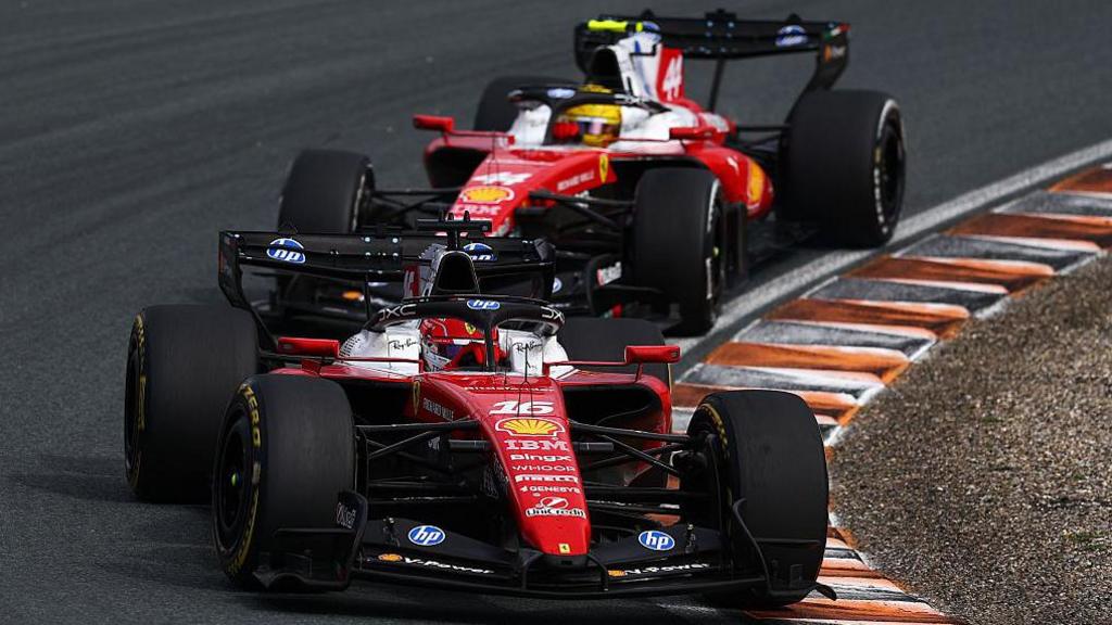 Lewis Hamilton drives behind Charles Leclerc on track in Zandvoort 