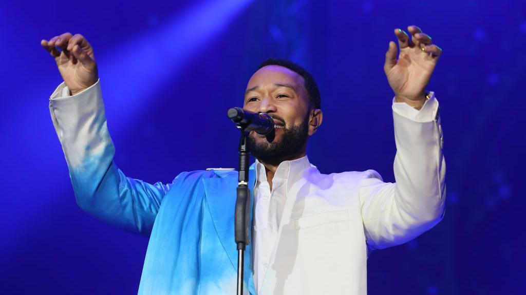 John Legend performs onstage during Global Citizen's Move Afrika: Kigali at BK Arena on February 21, 2025 in Kigali, Rwanda. (Photo by Jemal Countess/Getty Images for Global Citizen)