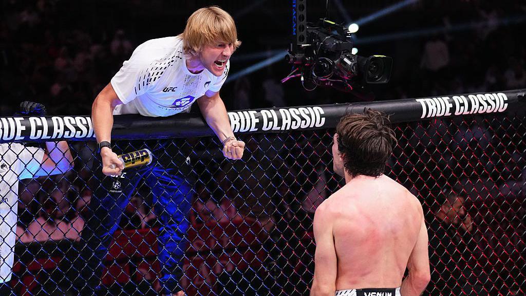 Luke Riley and Paddy Pimblett celebrate after Riley defeated Bogdan Grad