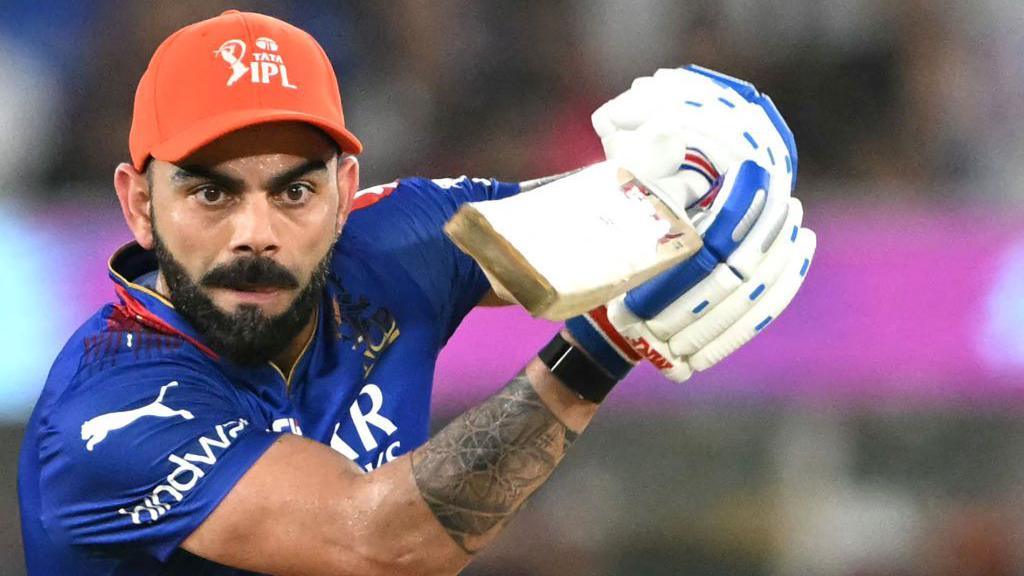 Royal Challengers Bengaluru's Virat Kohli plays a shot during the Indian Premier League (IPL) Twenty20 eliminator cricket match between Royal Challengers Bengaluru and Rajasthan Royals at the Narendra Modi Stadium in Ahmedabad on May 22, 2024. 