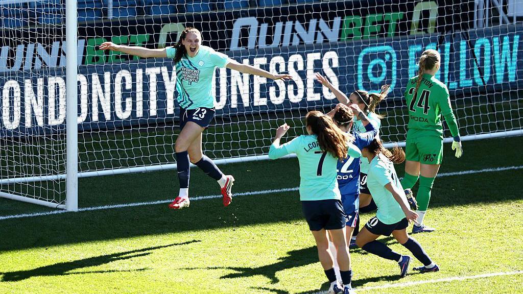 Isobel Goodwin celebrates after rescuing a point for London City Lionesses against Chelsea