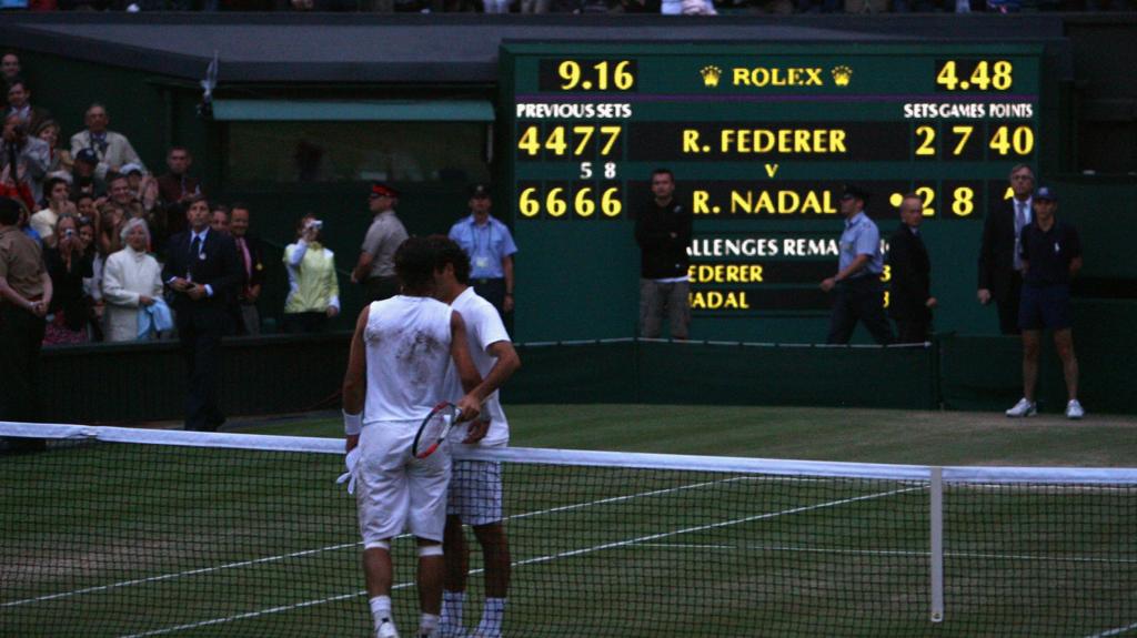 Rafael Nadal hugs Roger Federer at the end of their epic Wimbledon final in 2008