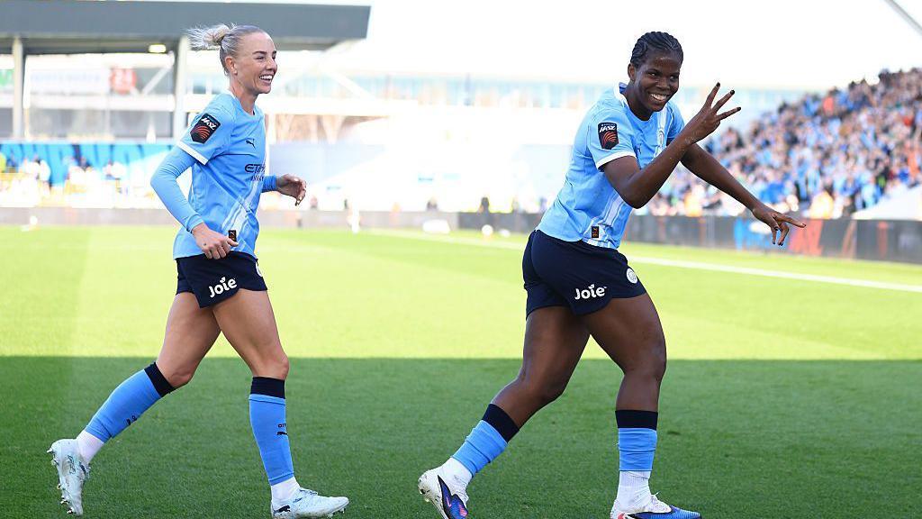 Alex Greenwood and Khadija Shaw