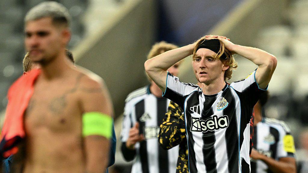 Anthony Gordon reacts at the end of the UEFA Champions League game between Newcastle United and FC Barcelona at St James' Park on 18 September, 2025