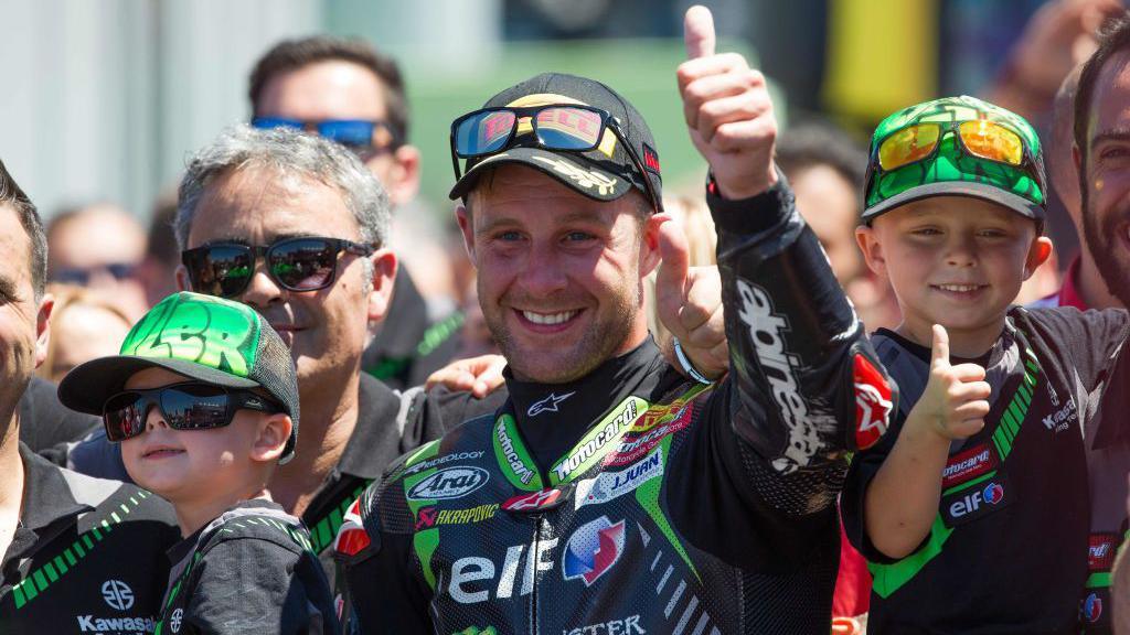 Jonathan Rea celebrates a 2017 win with sons Jake and Tyler