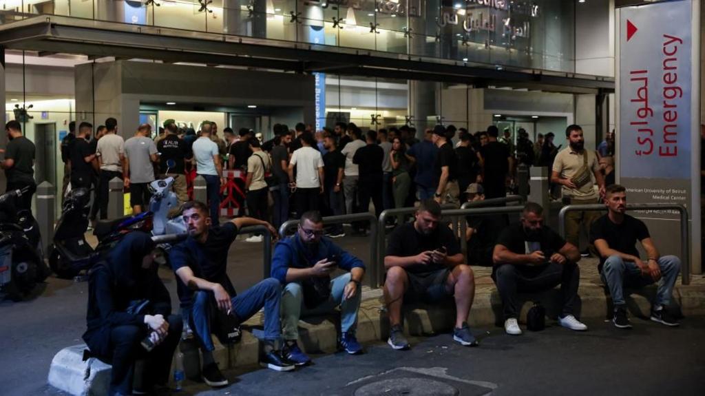 People gather outside American University of Beirut Medical Center in Beirut