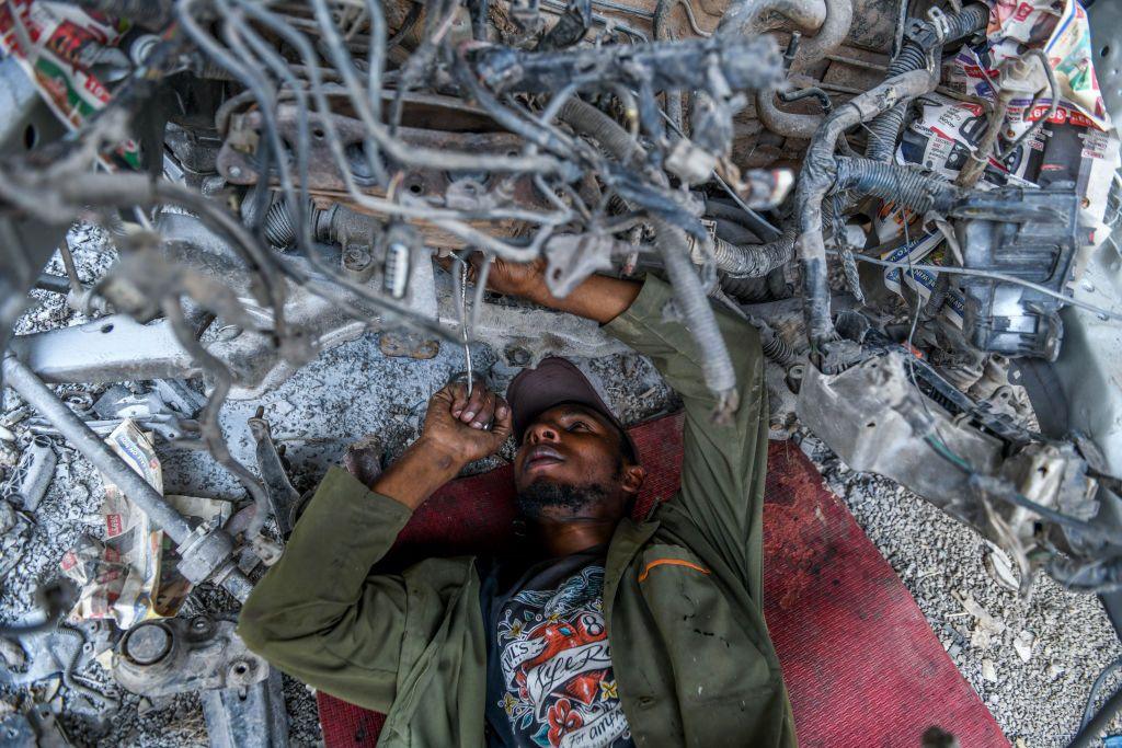 Workers at a car repair shop in Nairobi - Friday 27 September 2024