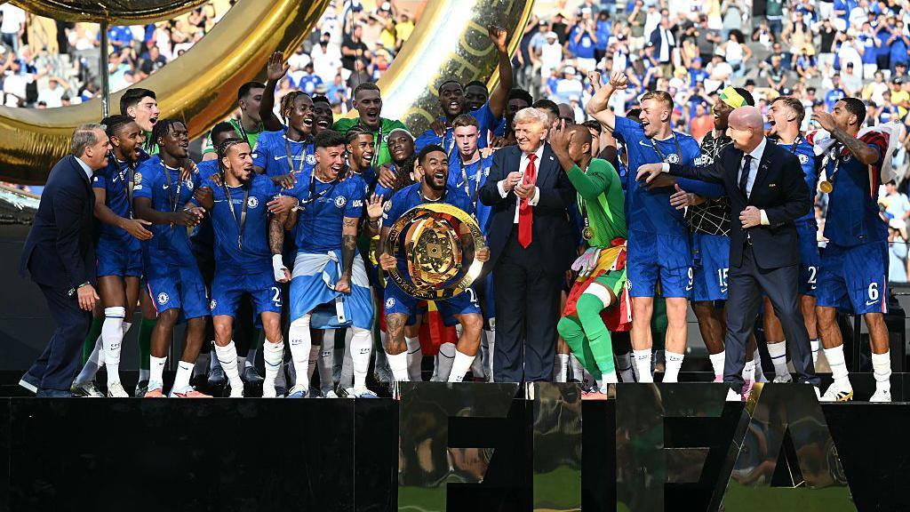 Reece James prepares to lift the Club World Cup trophy after Chelsea's victory over Paris St-Germain at the MetLife Stadium