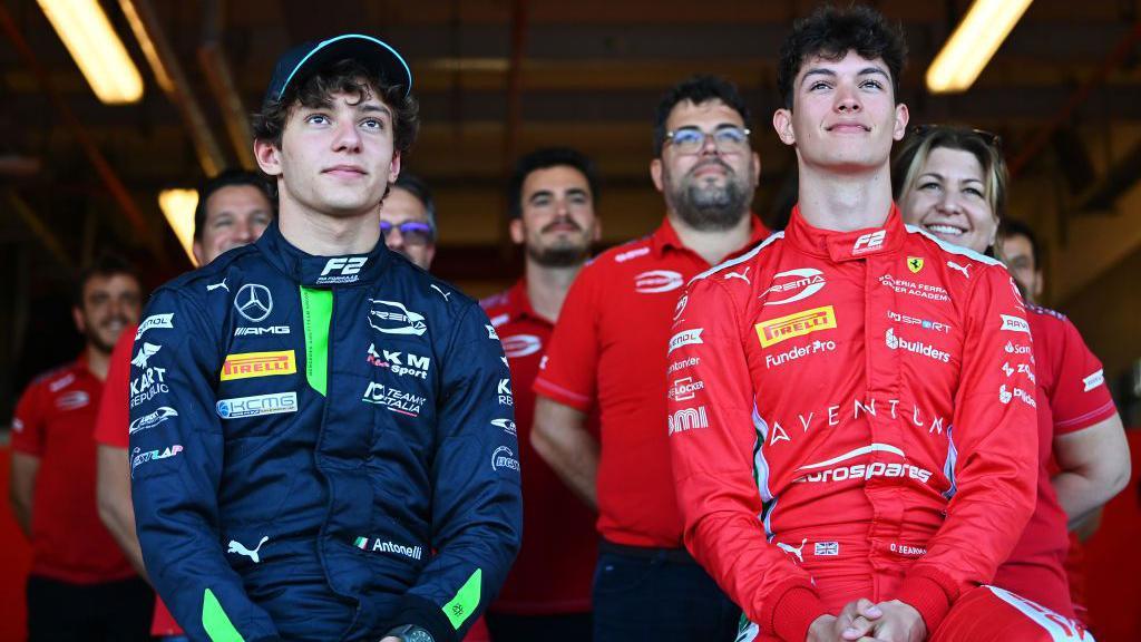 Kimi Antonelli and Oliver Bearman pose for a photograph at the end of the F2 season 