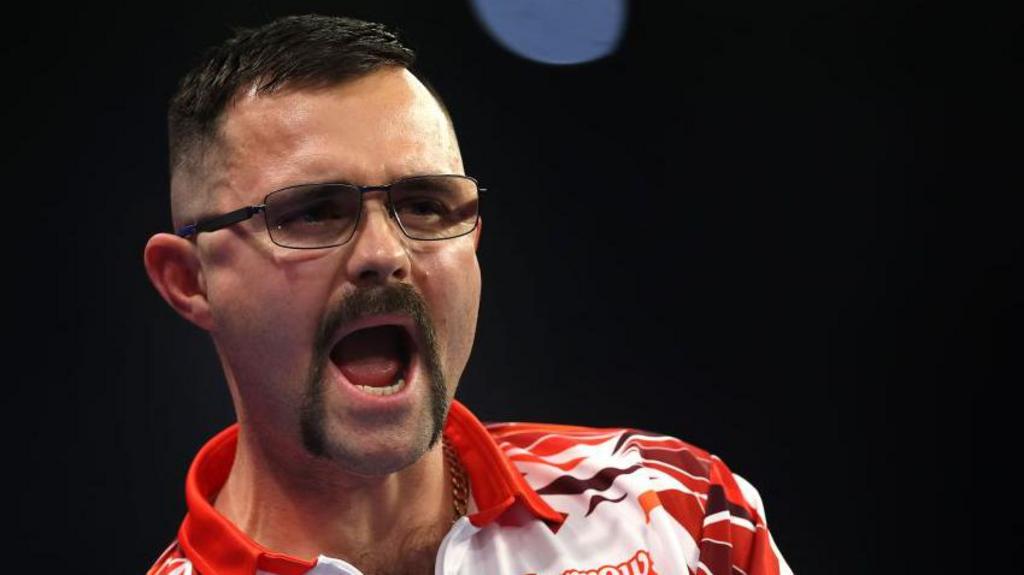 Heta beats Aspinall to win first PDC title of 2025