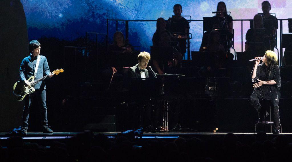 Johnny Marr on stage at the Brit Awards with Billie Eilish and her brother Finneas