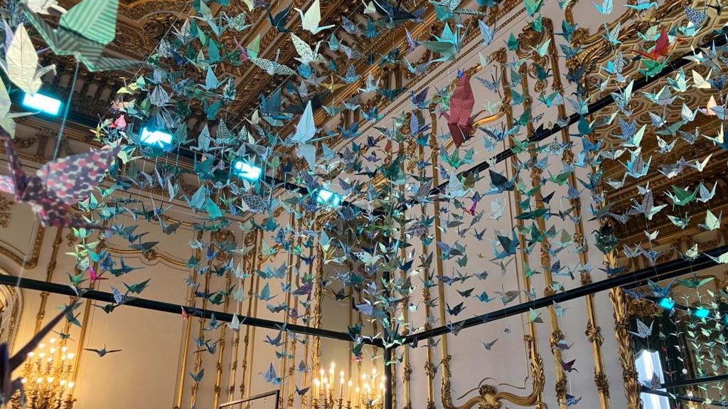 An art installation featuring 1,000 paper cranes
