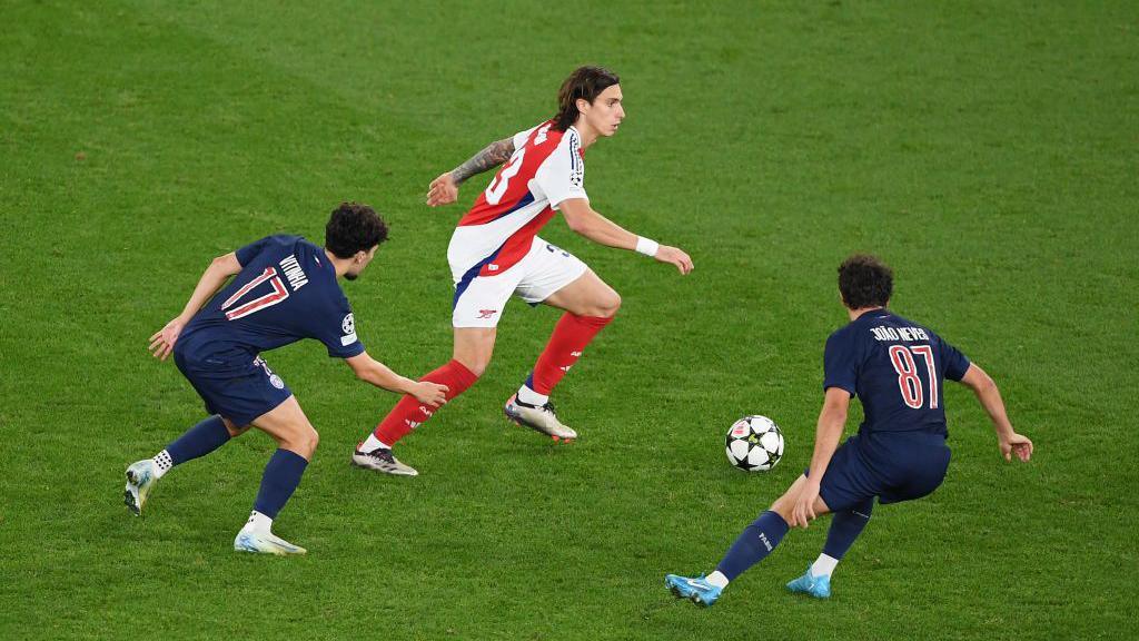 Riccardo Calafiori, Arsenal defender, in action against Paris St-Germain