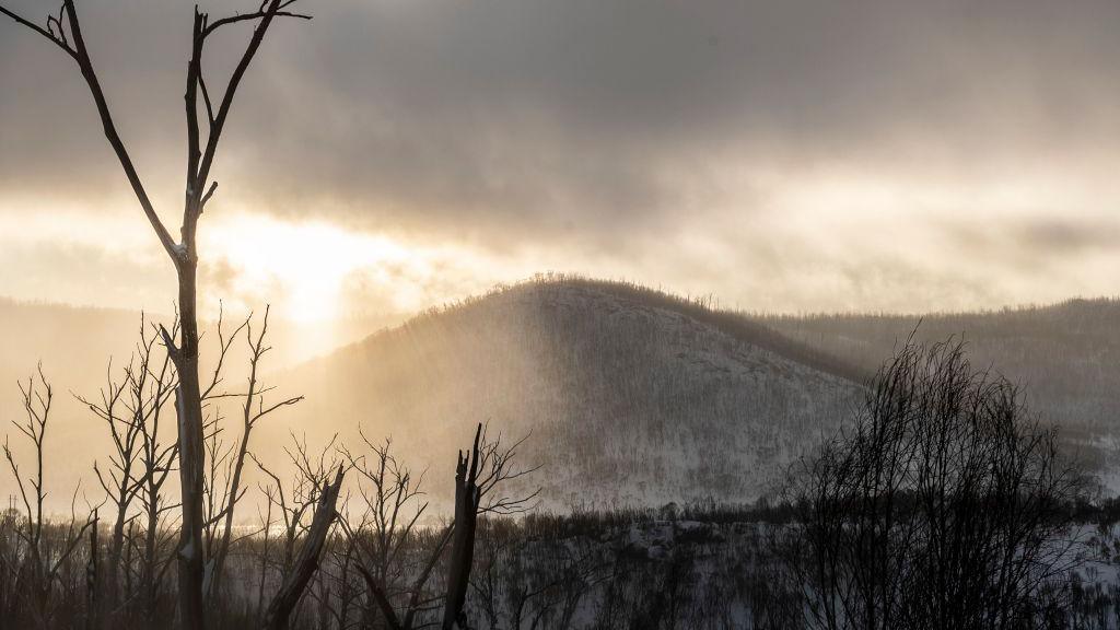 Dawn light creeps over mountains in the Kosciuszko National Park