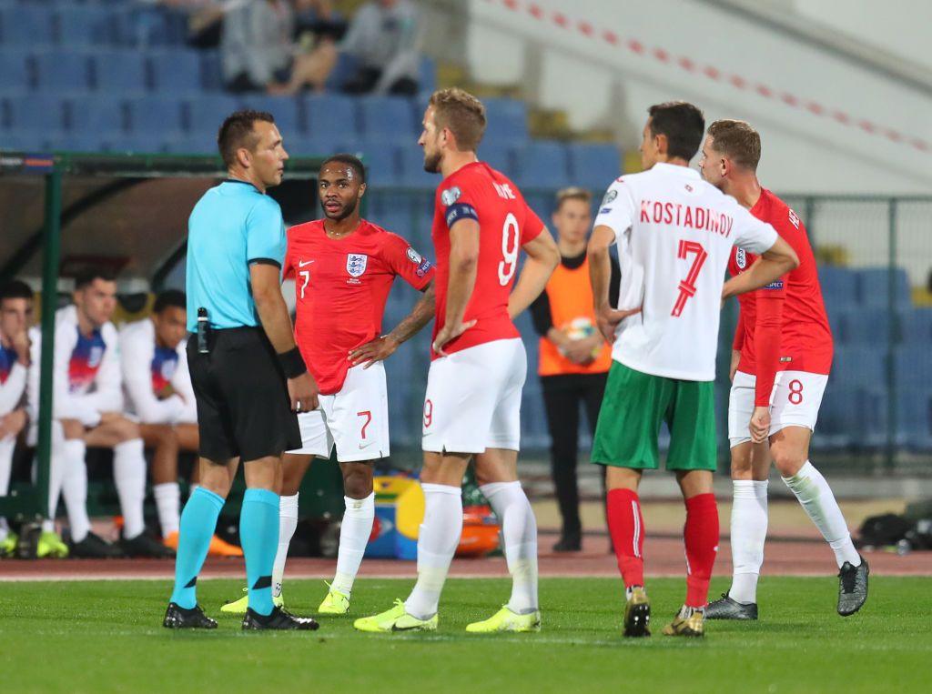 England's Harry Kane and Raheem Sterling speak to the referee against Bulgaria in Sofia