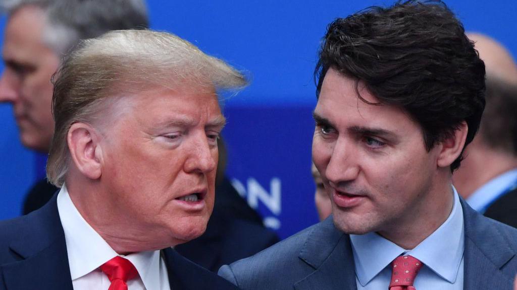 Donald Trump speaking with Justin Trudeau during a NATO summit in London