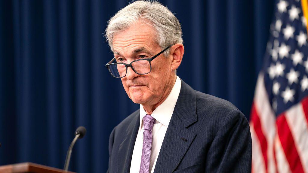 Jerome Powell stands at a lectern