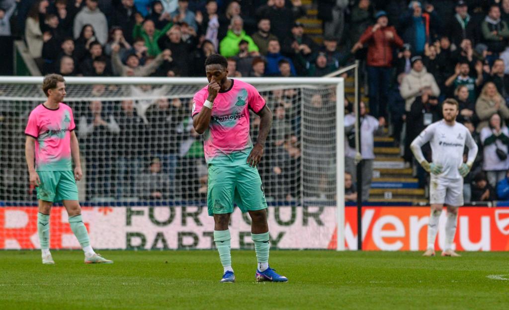 Doncaster Rovers players react after conceding