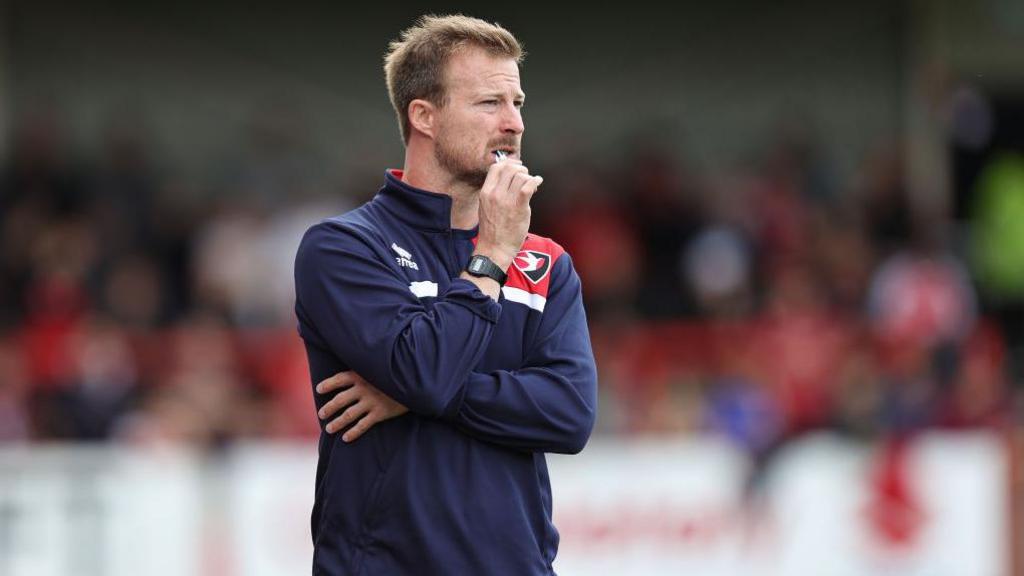 Wade Elliott looks on as Cheltenham Town play Northampton Town