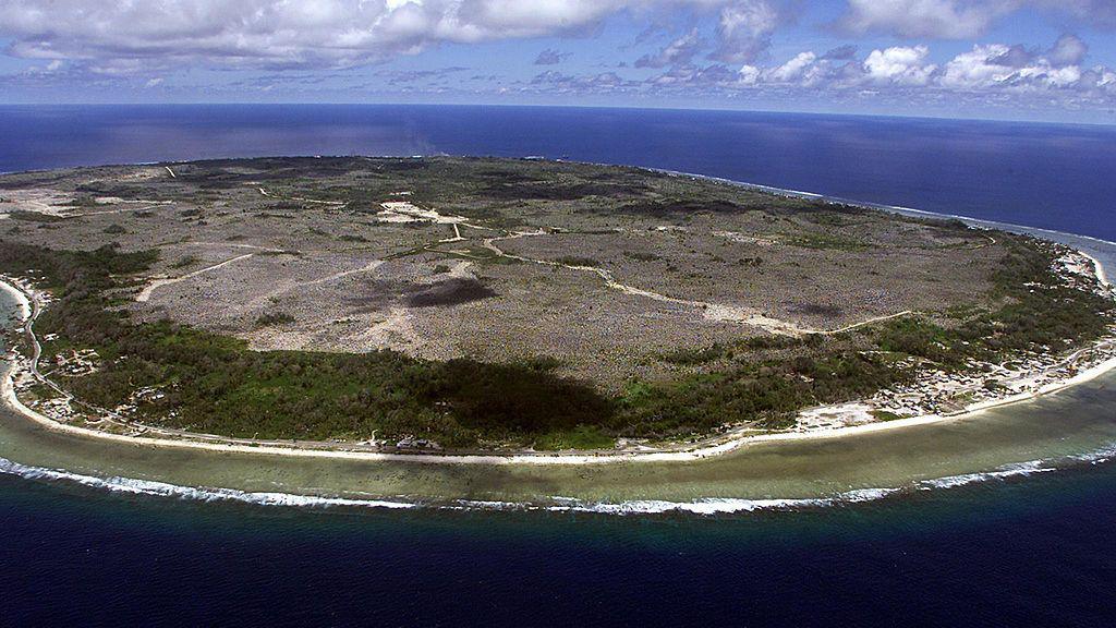 Aerial view of Nauru - it's a small island and looks quite barren.