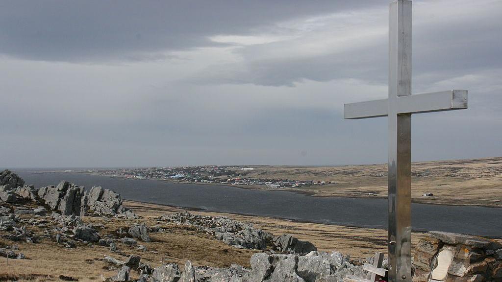 A cross on Wireless Ridge, just outside Stanley, Falkland Islands for those stands as a  memorial for those killed in the 1982 Conflict.