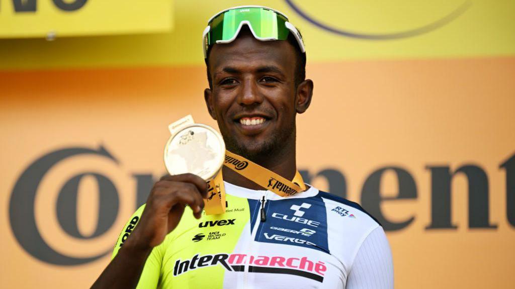 Biniam Girmay of Eritrea and Team Intermarche - Wanty celebrates at podium as stage winner during the 111th Tour de France 2024.