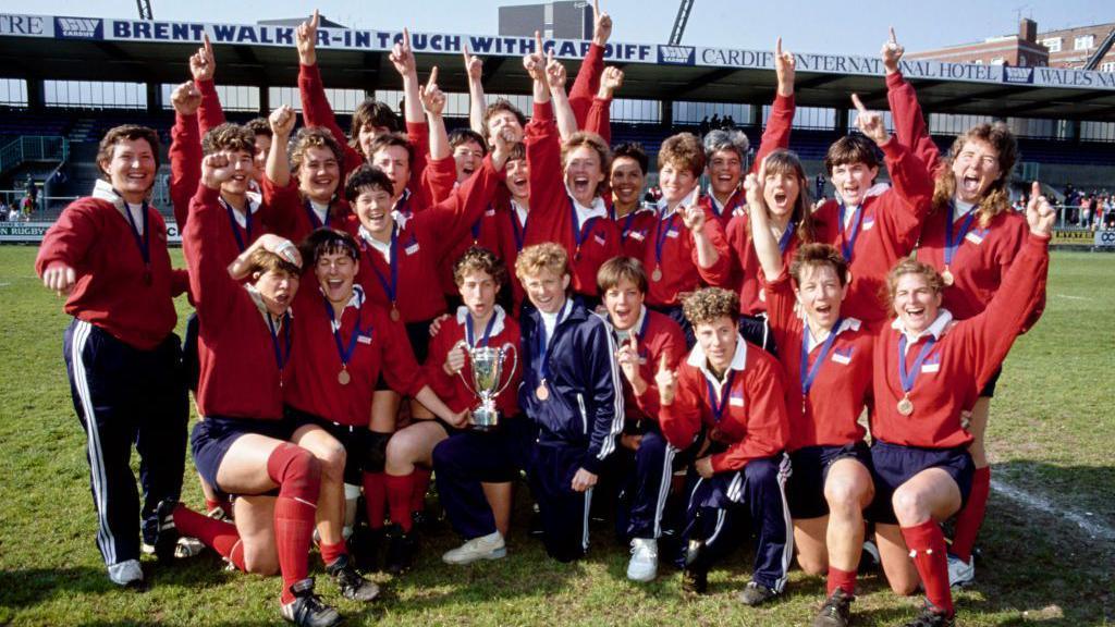 USA lift the 1991 Rugby World Cup trophy at Cardiff Arms Park