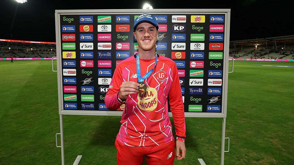Welsh cricketer Ben Kellaway holding his hero of the match award during the fifth edition of the Hundred.
