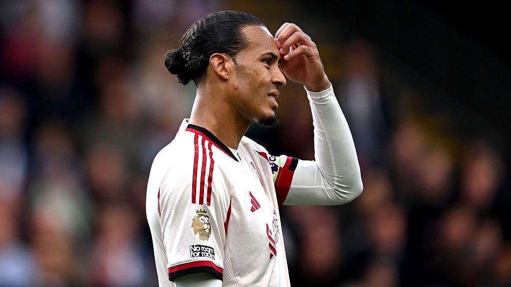 Virgil van Dijk of Liverpool reacts during the match