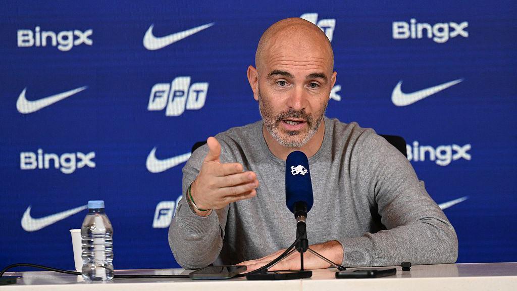 Enzo Maresca speaks at a media conference