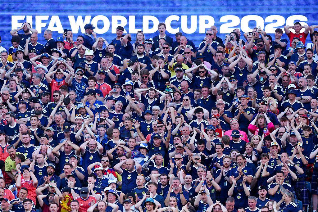 Scotland fans wit hhands on heads