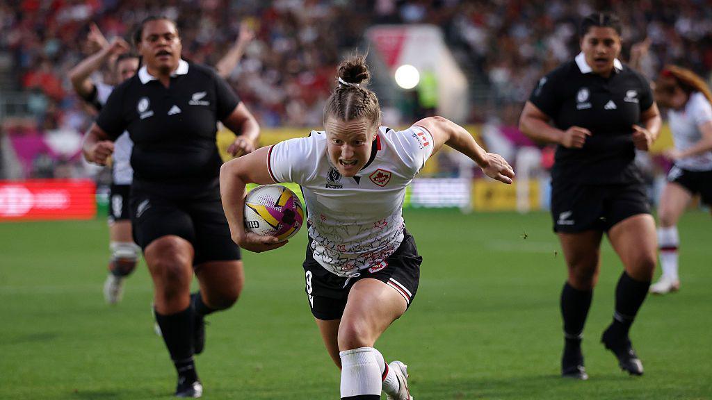Canada about to score a try against New Zealand.
