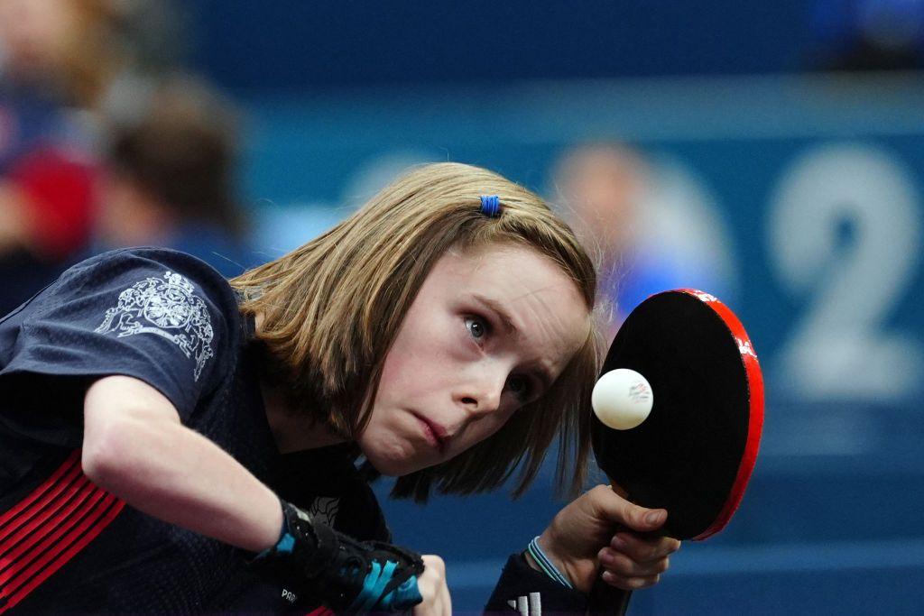 bly appears to be laser focused on the table tennis ball as she makes contact with her paddle mid-rally