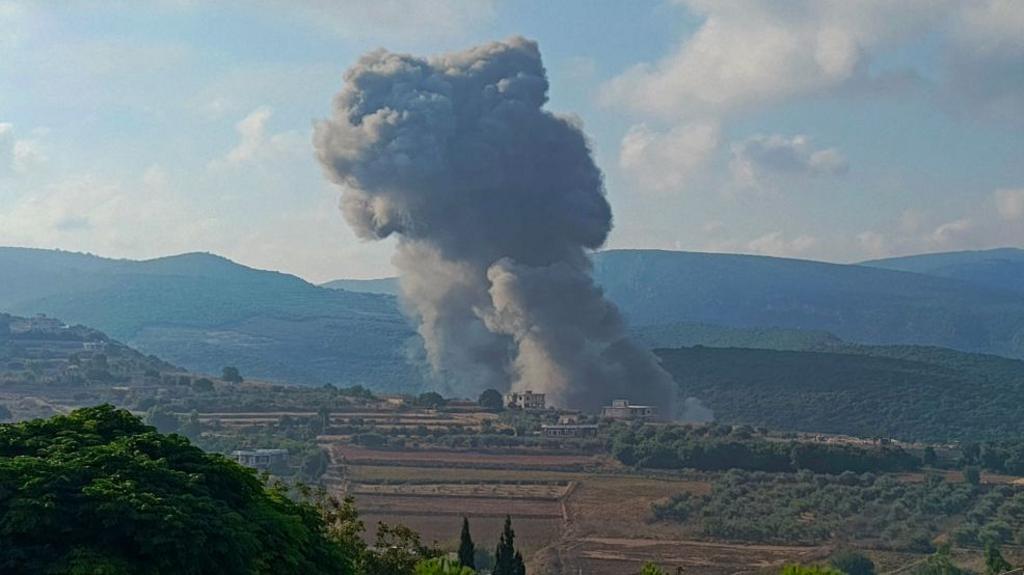 Smoke billows from the site of an Israeli airstrike on Zibqin in southern Lebanon