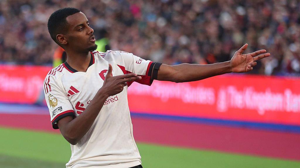 Alexsander Isak celebrates scoring at West Ham
