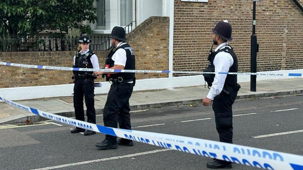 Metropolitan Police at scene of investigation at Scott's Road, off Devonport Road near Shepherds Bush W12