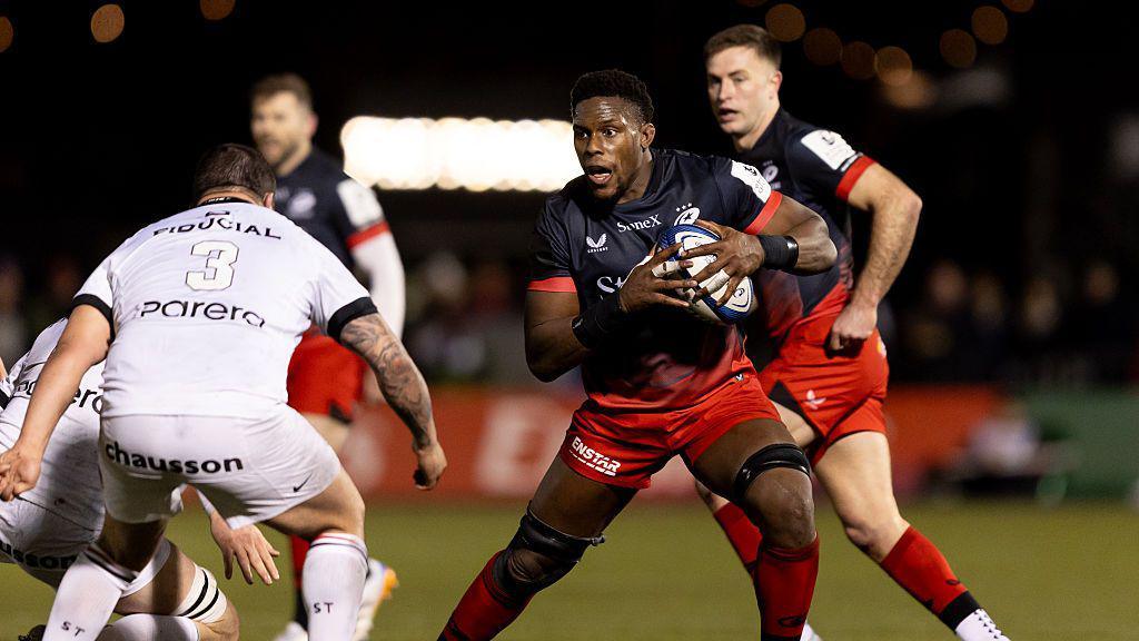 Maro Itoje playing for Saracens.