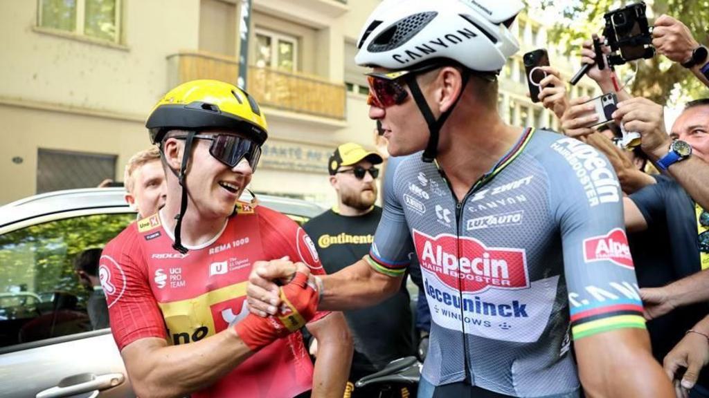Jonas Abrahamsen is congratulated by Mathieu van der Poel after winning stage 11 of the 2025 Tour de France