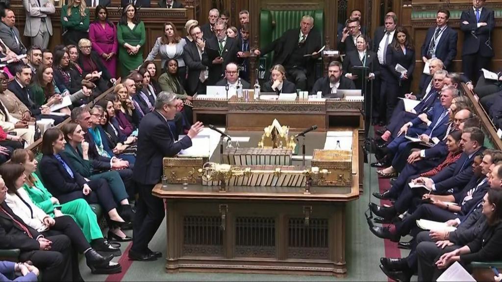 A wide shot of Starmer at the dispatch box in the House of Commons