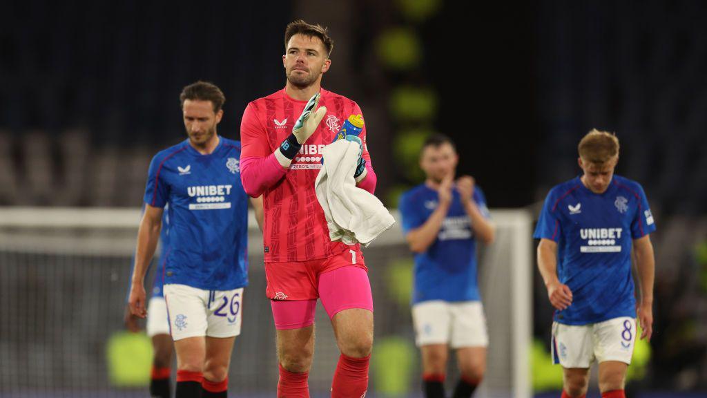 Rangers players looking dejected post-match