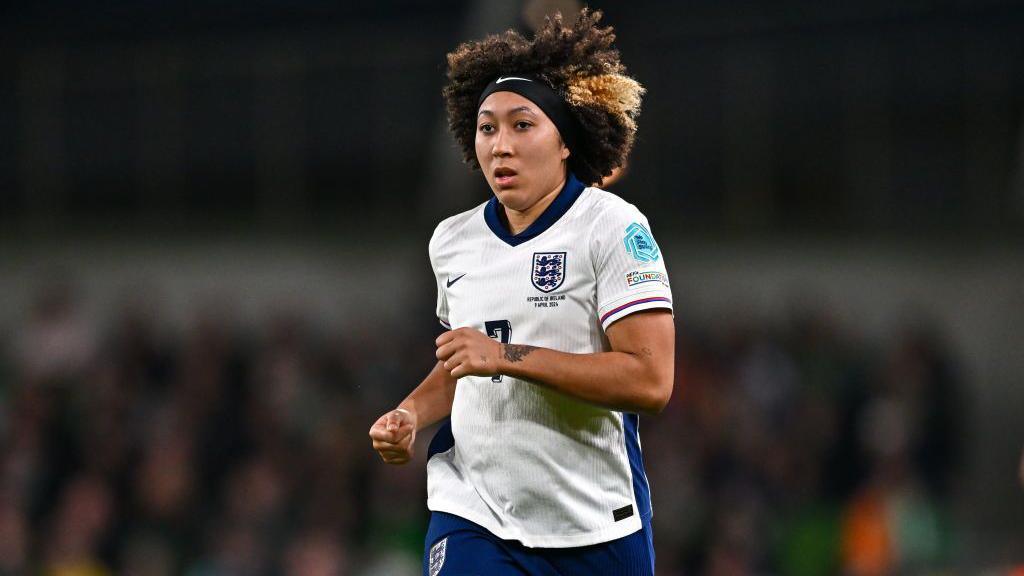 Lauren James on the pitch for England