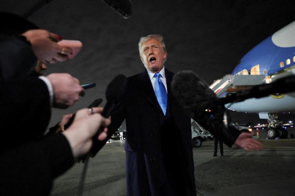 US President Donald Trump speaks to reporters