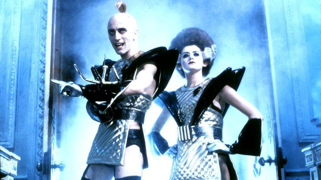 A screenshot from the film featuring Richard O'Brien and Patricia Quinn