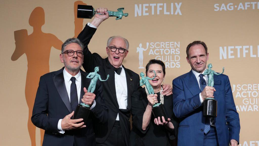 Sergio Castellitto, John Lithgow, Isabella Rossellini and Ralph Fiennes, winners of the Outstanding Performance by a Cast in a Motion Picture award for "Conclave," pose in the press room during the 31st Screen Actors Guild Awards at Shrine Auditorium and Expo Hall in Los Angeles.